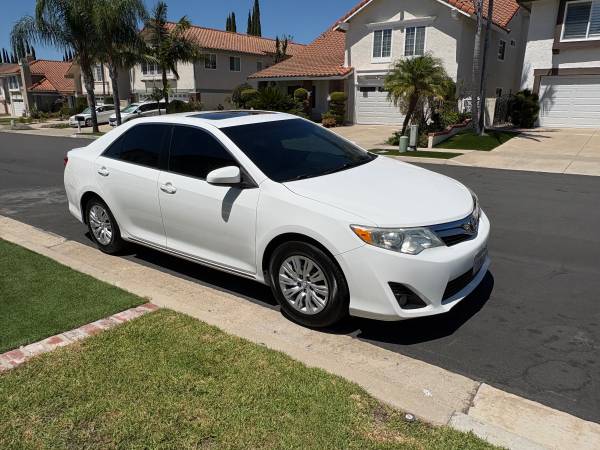 2014 Toyota Camry with only 73k miles on rebuilt engine for sale by owner