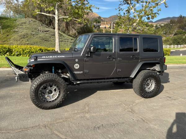 2016 Jeep Wrangler Rubicon 4dr- 65k miles-Granite Crystal Metallic for sale by owner