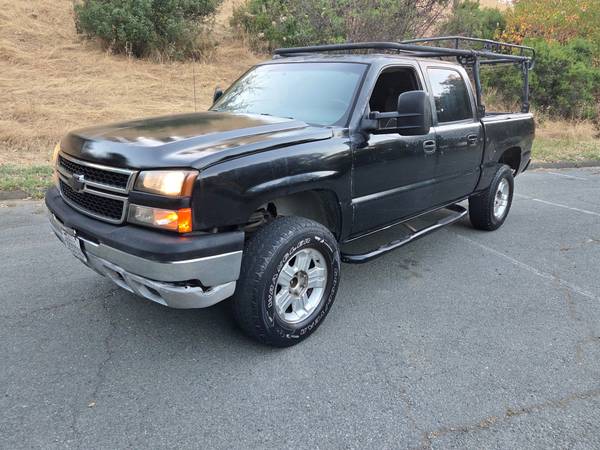2005 Chevy Silverado crew cab work truck runs great for sale by owner