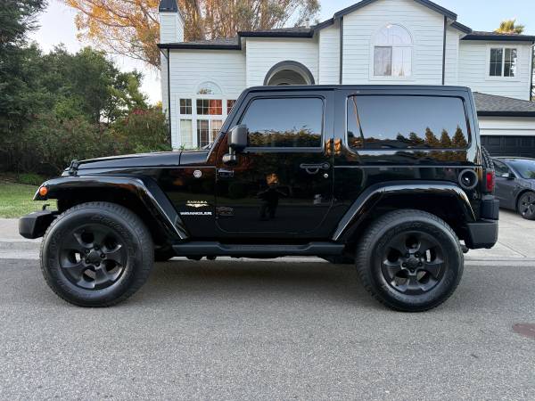 2013 Jeep wrangler Sahara 9400 miles for sale by owner