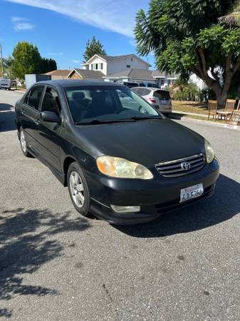 Clean 03 Toyota Corolla for sale by owner