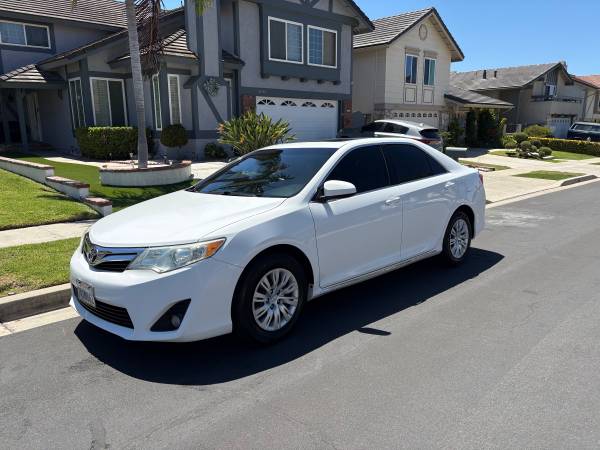 2014 Toyota Camry with only 73k miles on rebuilt engine for sale by owner